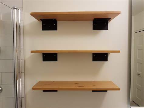 how strong are the metal brackets in ikea glass shelves|ikea wall mounted shelving bracket.